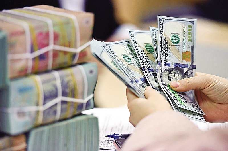 Fed hạ lãi suất, tỷ giá USD/VND năm 2026 sẽ ra sao?- Ảnh 1.