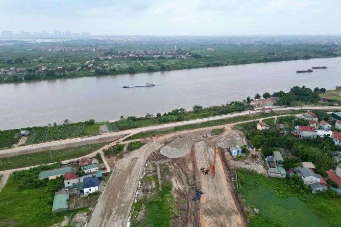 tin-vui-lon-cho-cay-cau-4_900-ty-vuot-song-hong-1