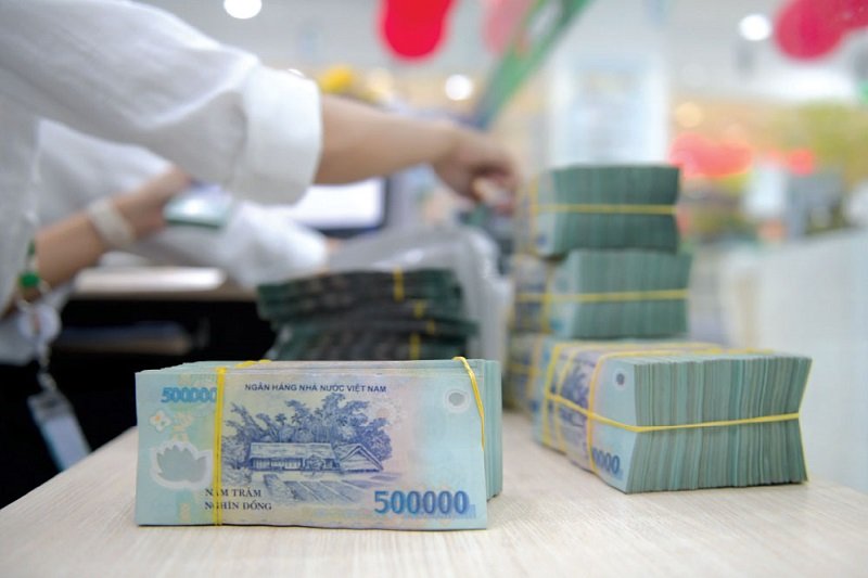 Phó Thủ tướng yêu cầu kéo giảm lãi suất cho vay- Ảnh 1.